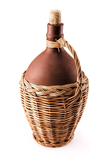 Moravexi rosé wine bottle with blush pink wine and fresh summer setting